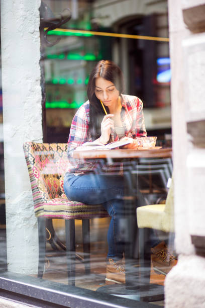 istock Cute girl enjoy a coffee break 680386258