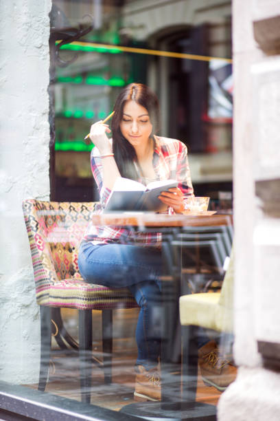 istock Cute girl enjoy a coffee break 680386260