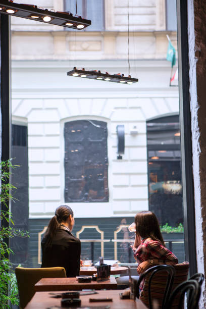 istock Two girl enjoy a coffee break 680386296