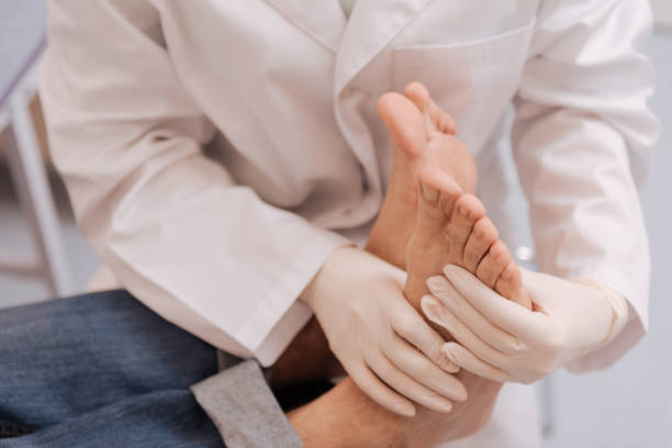 istock Competent nice doctor using medical gloves 680386934