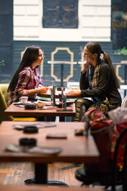 istock Two girl enjoy a coffee break 680387154