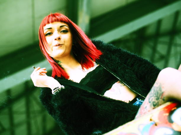 istock smoking girl portrait 680392434
