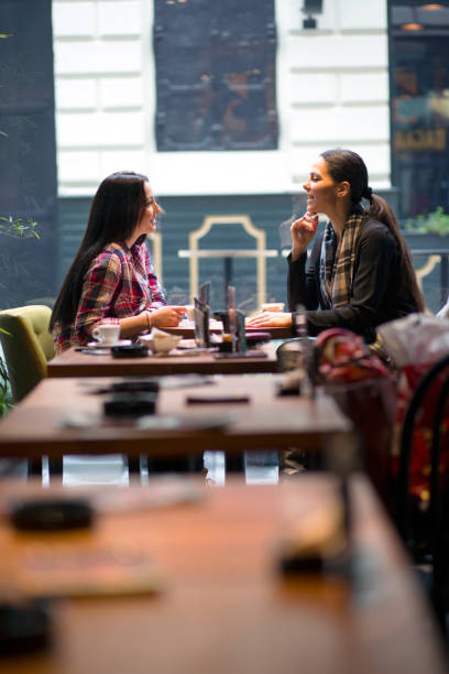 istock Two girl enjoy a coffee break 680392554