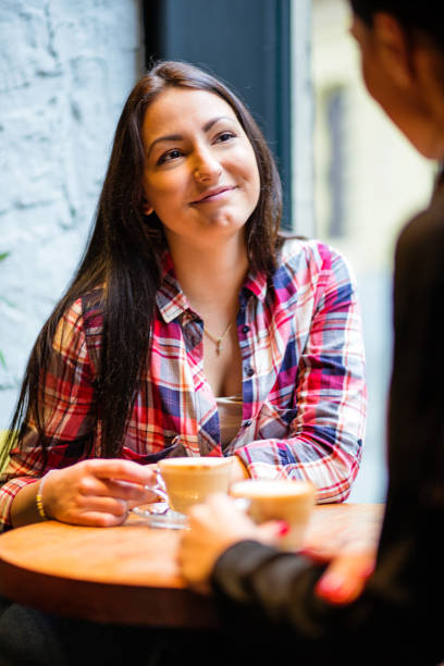 istock Two girl enjoy a coffee break. 680393206