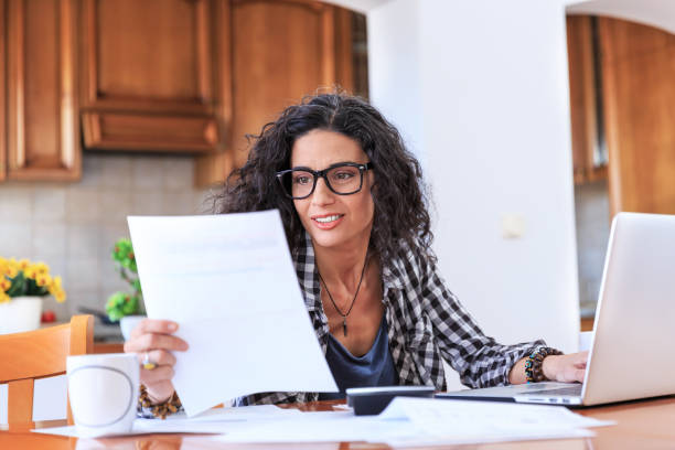 istock Young woman working at home 680393300
