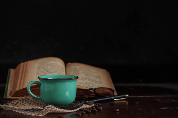 istock coffee and books on desk. 680395768
