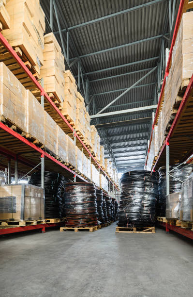 istock Long shelves with a variety of boxes and containers 680402614