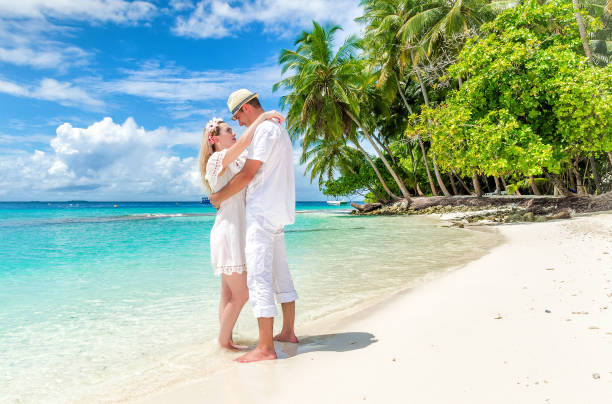 istock Two lovers stroll around the island. The Maldives. 680402750