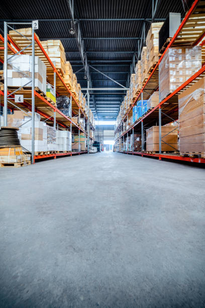 istock Long shelves with a variety of boxes and containers 680402812