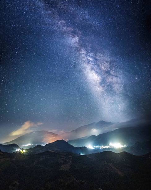 istock Milky way and village 680404198