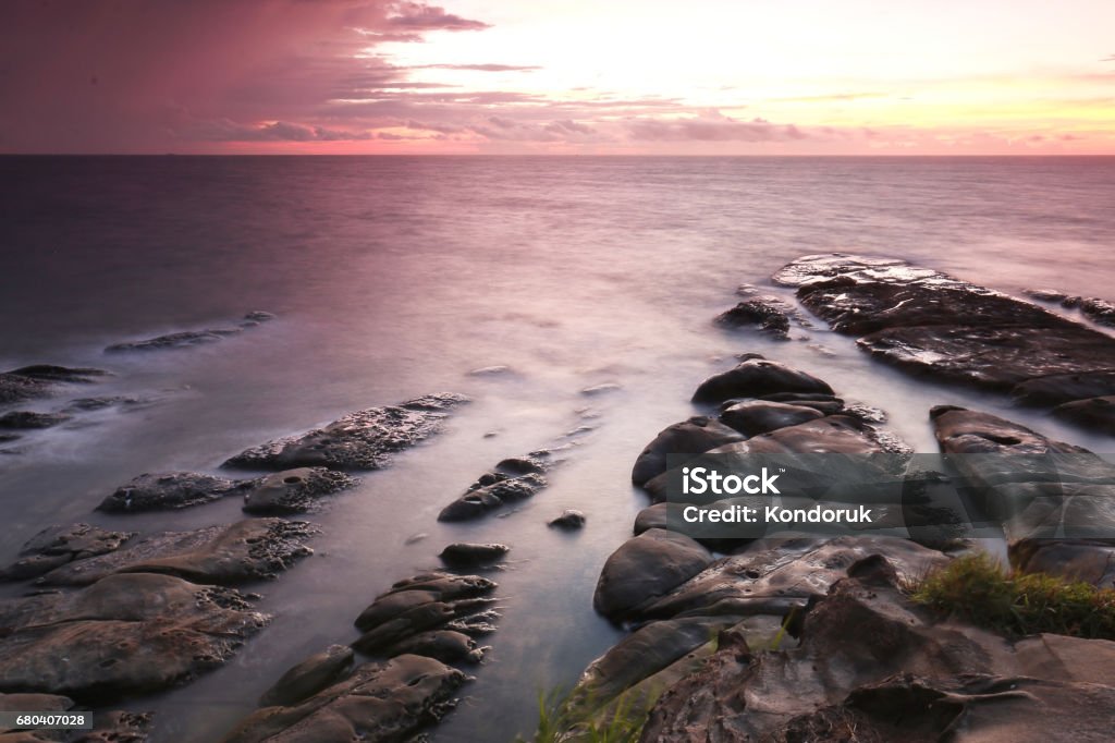 Sunset in Tip Of Borneo, Kudat Sabah Long Exposure shot in tip of borneo during sunset Beach Stock Photo