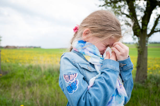 istock Girl suffering from allergy and headache 680407612