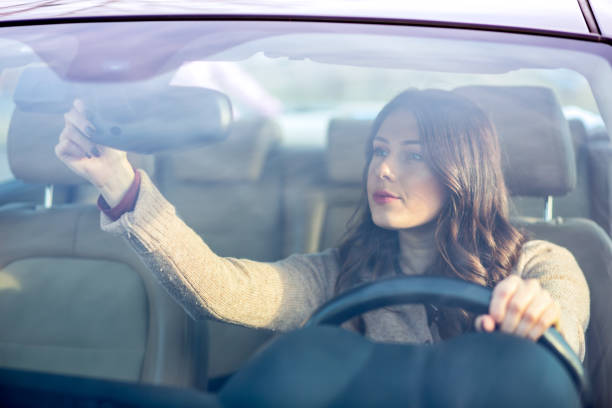 istock Pretty girl driving a car. 680409618