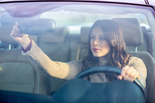 istock Pretty girl driving a car. 680409646
