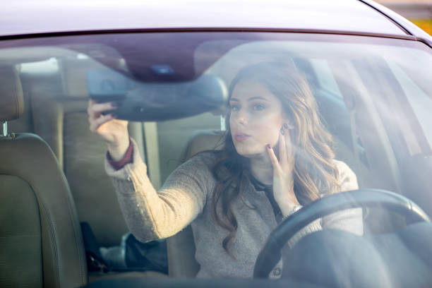 istock Pretty girl driving a car. 680409674