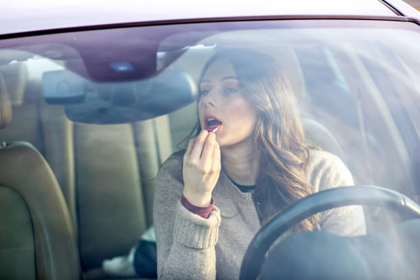 istock Pretty girl driving a car. 680409722