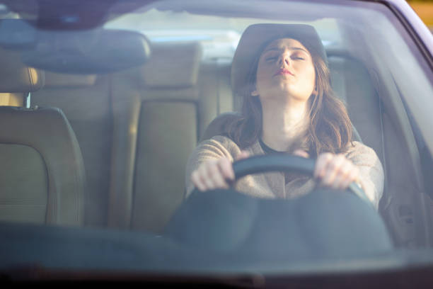 istock Beautiful girl driving a car. 680409886