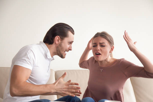 istock Young couple quarrelling, shouting and blaming each other for problems 680409946