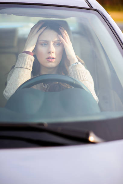istock Beautiful girl driving a car. 680410074