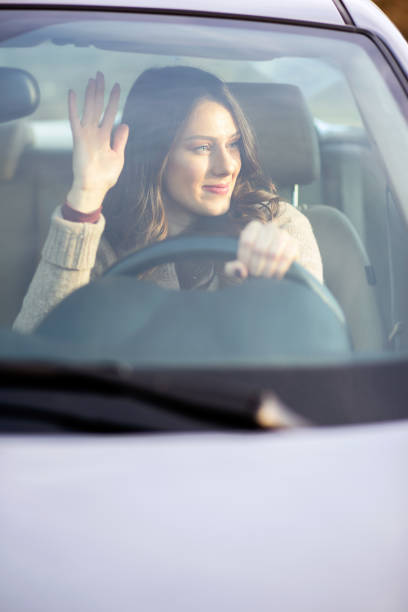 istock Beautiful girl driving a car. 680410080
