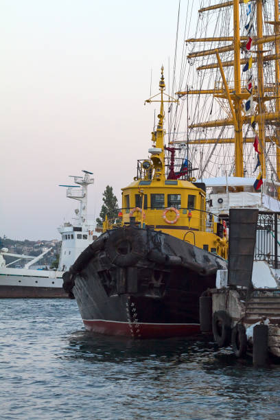 istock Marine dock and marine ship, tug. 680411668