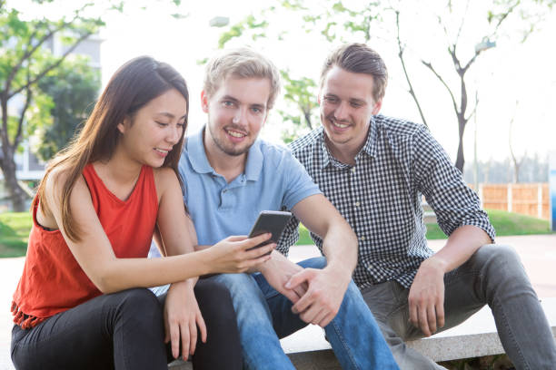 istock Smiling young man enjoying leisure with friends 680417352