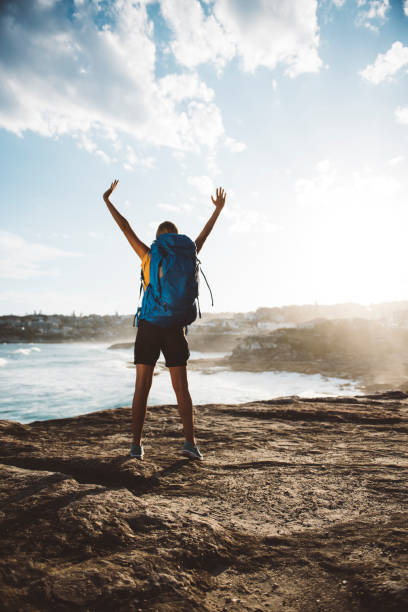 istock Girl open her arms to hiking 680431264