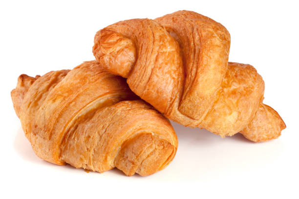 istock two croissant isolated on white background closeup 680471264