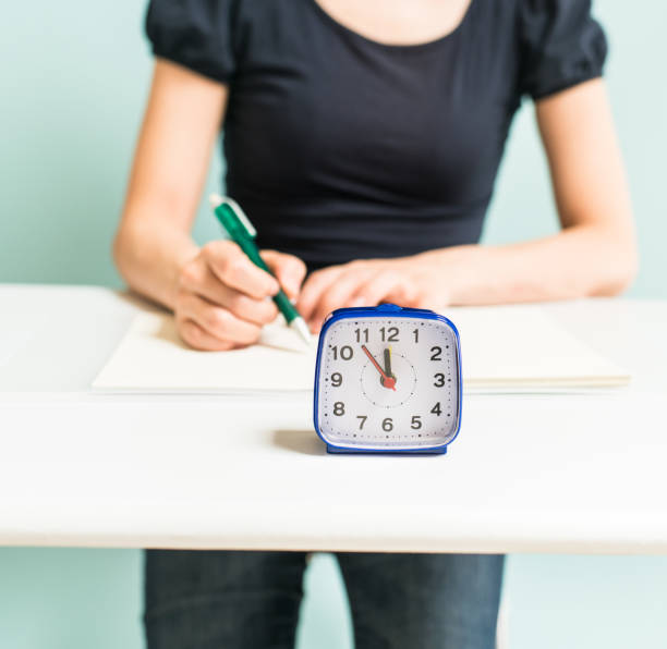 istock Studying woman and the time 680471266