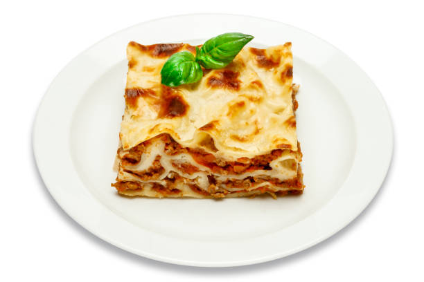 istock Portion of tasty lasagna isolated on white 680471758