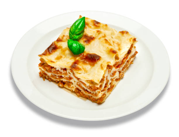 istock Portion of tasty lasagna isolated on white 680471902