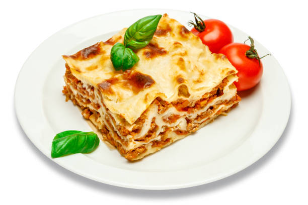 istock Portion of tasty lasagna isolated on white 680472076