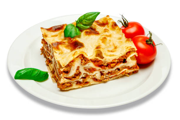 istock Portion of tasty lasagna isolated on white 680472318