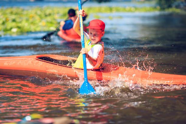 istock Young people are kayaking on a river in beautiful nature. 680481862