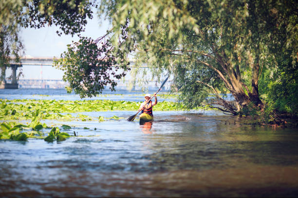 istock Young people are kayaking on a river in beautiful nature. 680481886