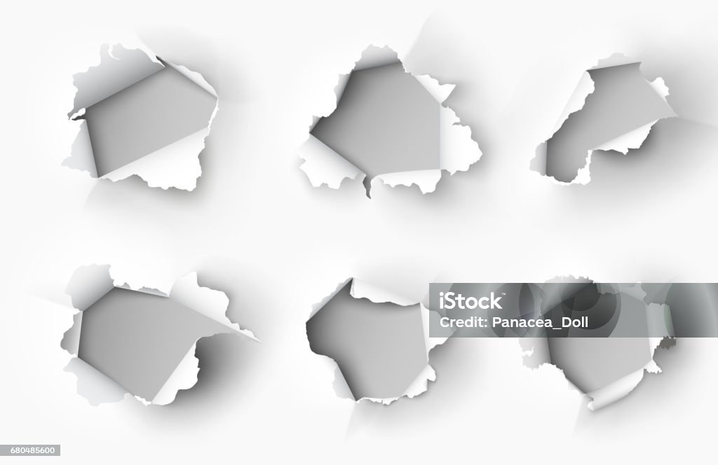 Holes torn in paper on white background Paper stock vector