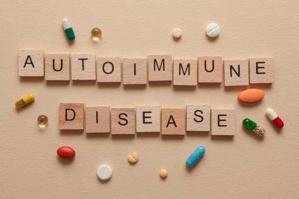 Autoimmune disease The word autoimmune disease formed with wooden letters and pills around autoantibody stock pictures, royalty-free photos & images