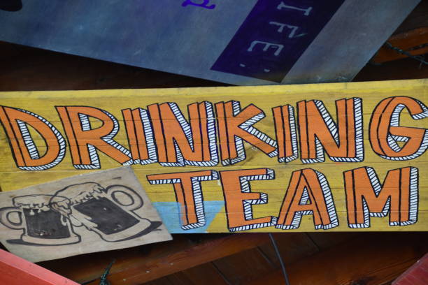 istock Sign in the restaurant - drinking team 680502870