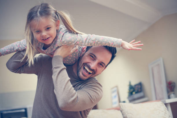 istock Young dad with cute daughter at home. 680508194