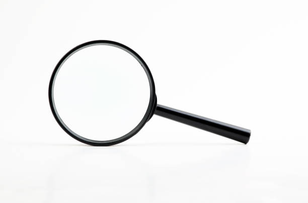 magnifying glass - studio shot technology ideas metal imagens e fotografias de stock