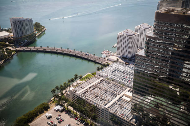 istock Aerial view of Brickell Key bridge and Atlantic ocean 680514306