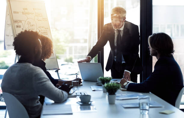 istock Strategizing in the boardroom 680514988