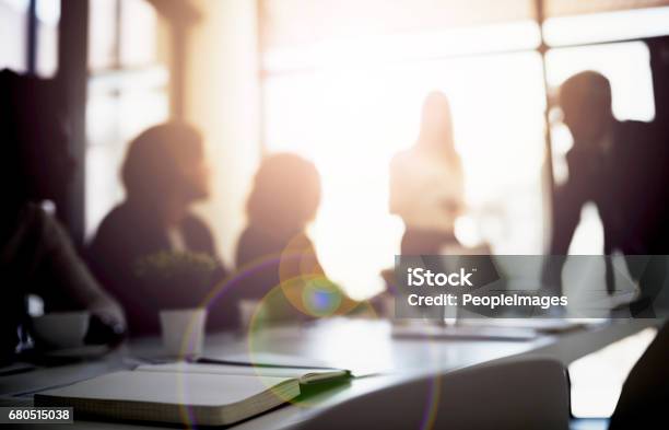 Conceptualizing Boardroom Business Stock Photo - Download Image Now - Obscured Face, In Silhouette, Meeting