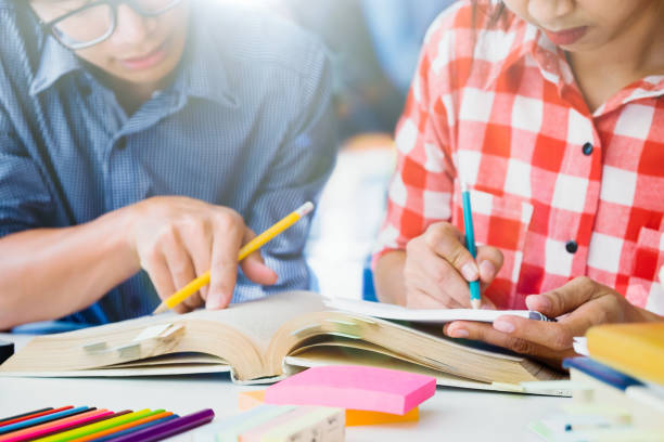 istock Young students campus helps friend catching up and learning. 680515868
