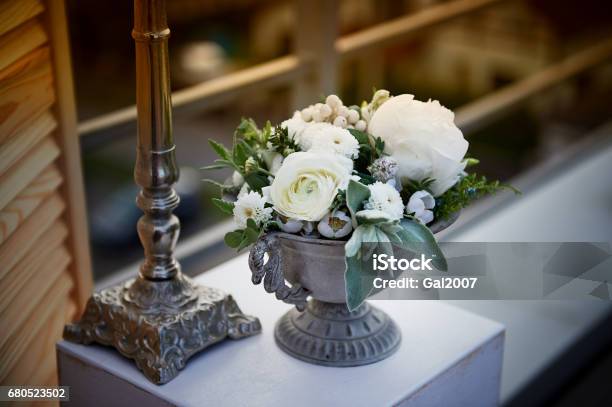 Wedding Decor Floral Arrangement With Berries White Flowers Old Metal  Candle Holder Stock Photo - Download Image Now - iStock