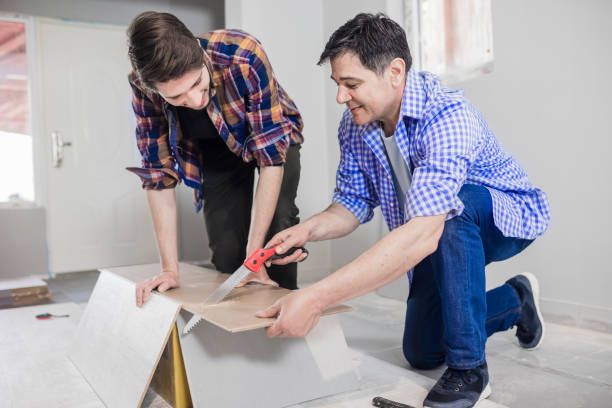 istock Carpenters installing a wooden flooring 680529574