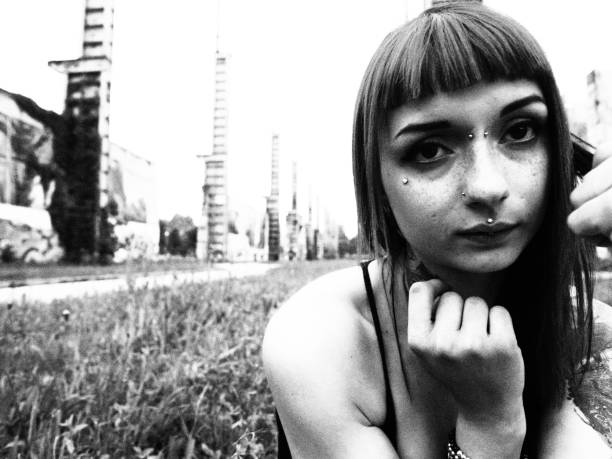 istock tattooed girl black and white portrait 680529992