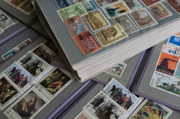 istock Old phylatelic albums with postmarks from different countries 680531044