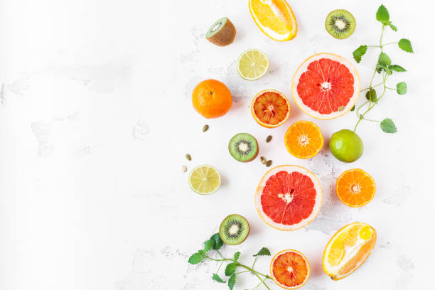 istock Colorful fresh fruit on white table. Flat lay, top view 680547134