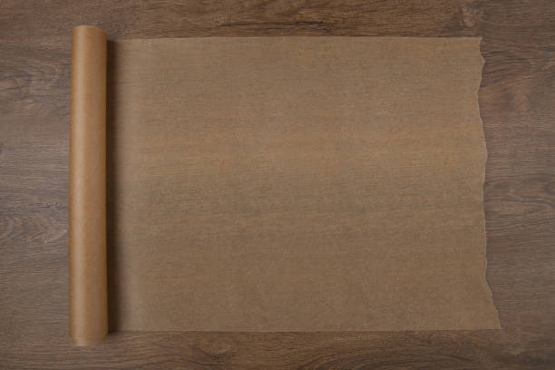 istock Baking paper on wooden background top view. 680547814